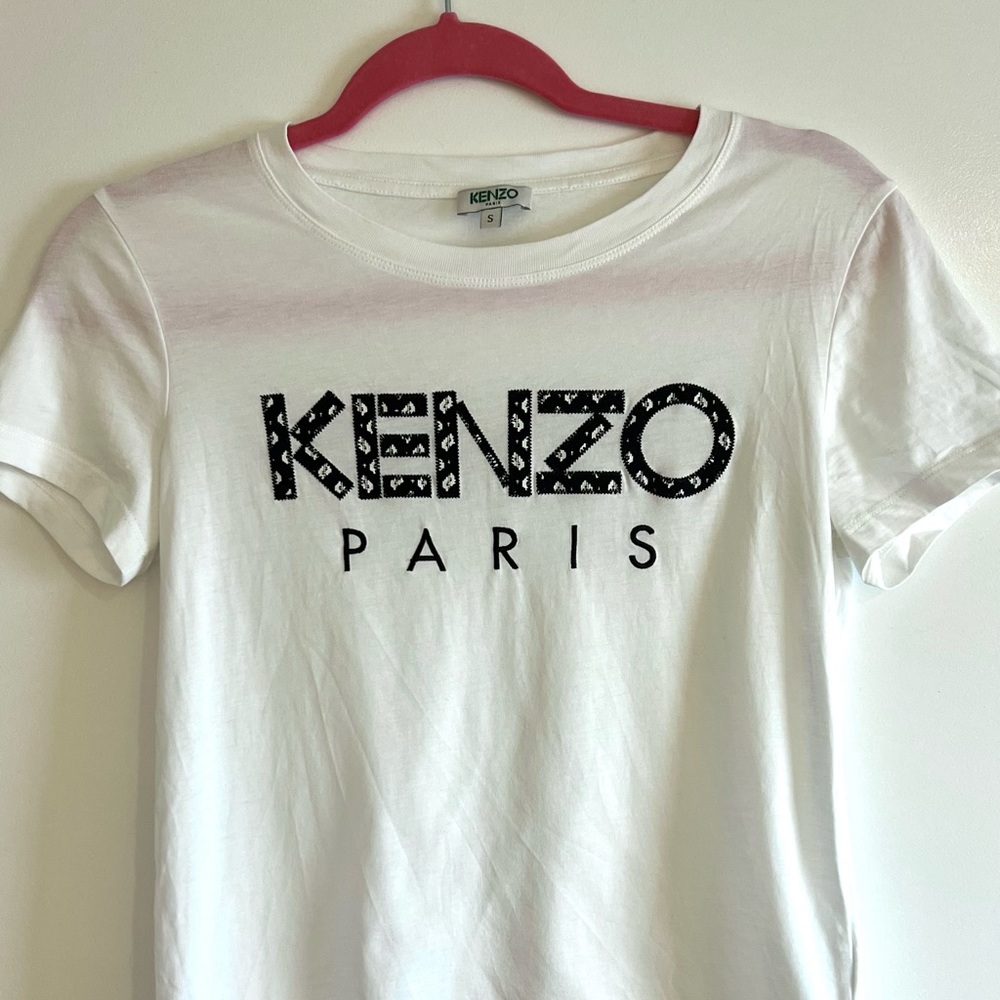 Kenzo T-shirt. Runs small, I recommend to buy if you wear size XS (0/2).